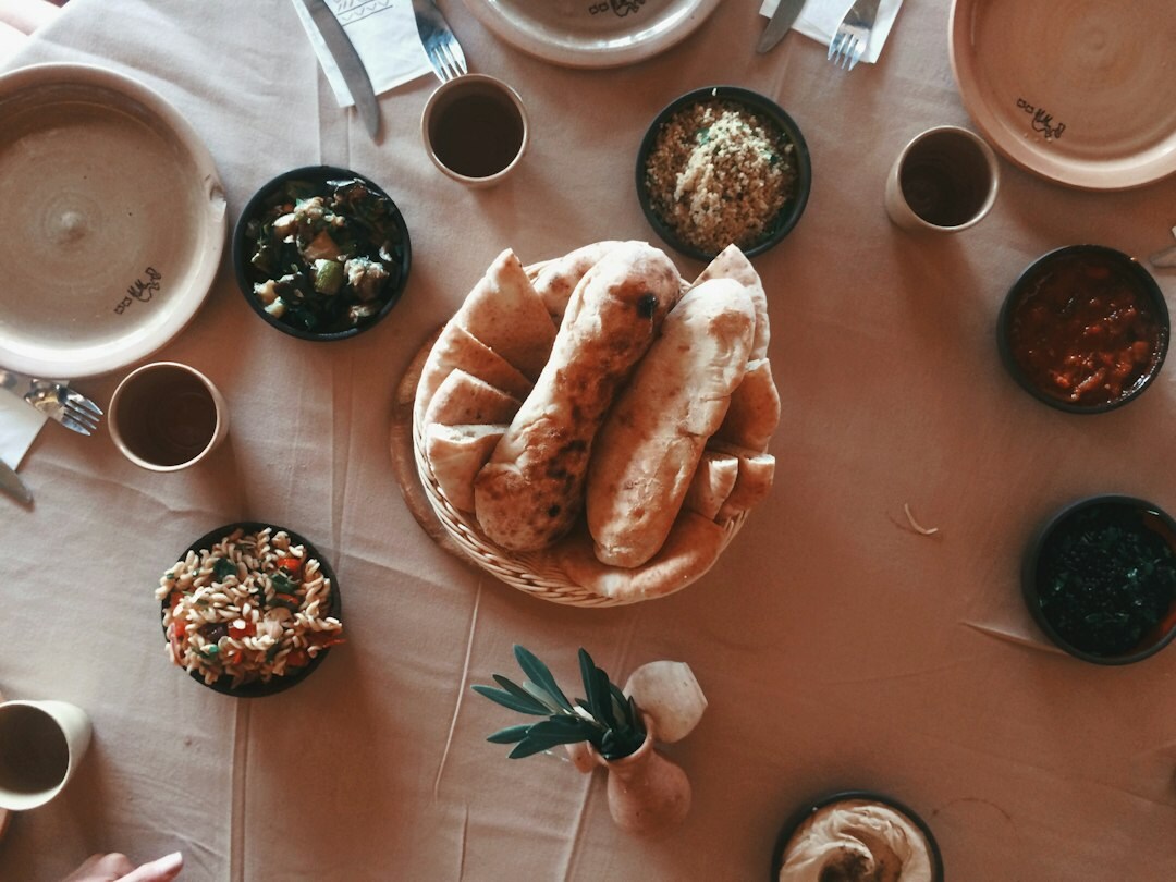 Traditional Czech dinner table with home-cooked dishes, bread and ceramic bowls